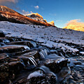 Snowy Mountain Stream at Sunrise